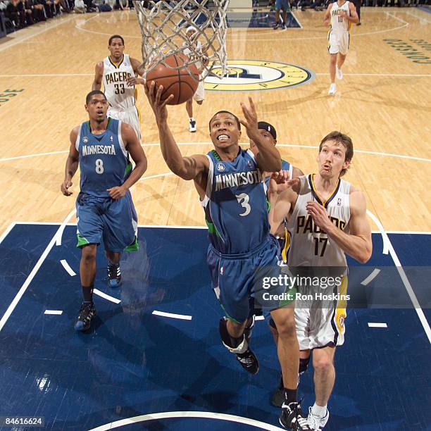 Sebastian Telfair of the Minnesota Timberwolves shoots over Mike Dunleavy of the Indiana Pacers at Conseco Fieldhouse February 3, 2009 in...