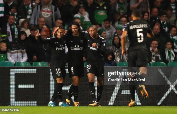 Neymar of PSG celebrates scoring his sides first goal with Edinson Cavani of PSG and Kylian Mbappe of PSG during the UEFA Champions League Group B...
