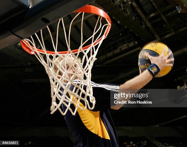 Member of the Indiana Pacers PowerPack jams the ball during a timeout as the Pacers took on the Minnesota Timberwolves at Conseco Fieldhouse February...