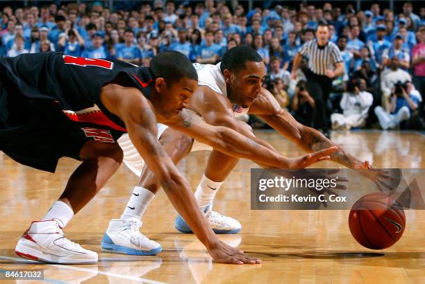 Wayne Ellington of the North Carolina Tar Heels dives for a loose ball against Cliff Tucker of the Maryland Terrapins during the game on February 3,...