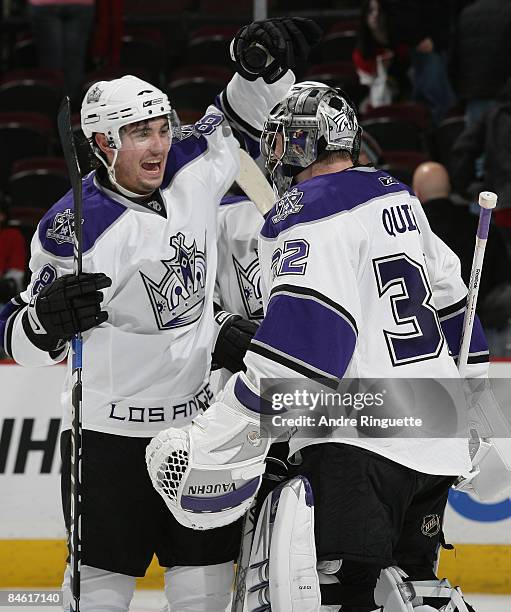 Drew Doughty of the Los Angeles Kings congratulates teammate Jonathan Quick for his shutout win over the Ottawa Senators at Scotiabank Place on...