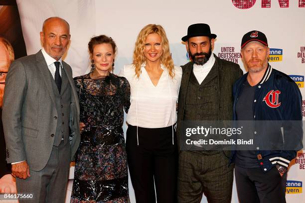 Heiner Lauterbach, cast, Veronica Ferres, Eray Egilmez and Simon Schwarz during the 'Unter deutschen Betten' premiere at Mathaeser Filmpalast on...