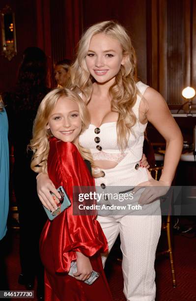 Alyvia Lind and Stevie Lynn Jones pose backstage at the Sherri Hill NYFW SS18 fashion show at Gotham Hall on September 12, 2017 in New York City.