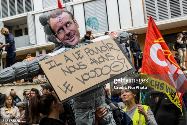 Demonstrators take part in a protest called by several French unions against the labour law reform in Lyon, on September 12, 2017. French unions...