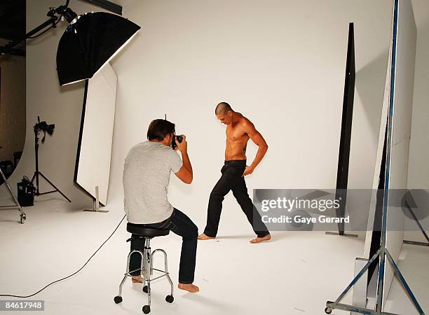 Model Didier - The Face of "Industrie" poses during a photo shoot for the announcement of the David Jones Industrie partnership at the Echelon...