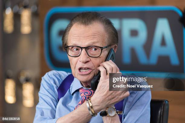 Larry King displays his phone at "Extra" at Universal Studios Hollywood on September 12, 2017 in Universal City, California.
