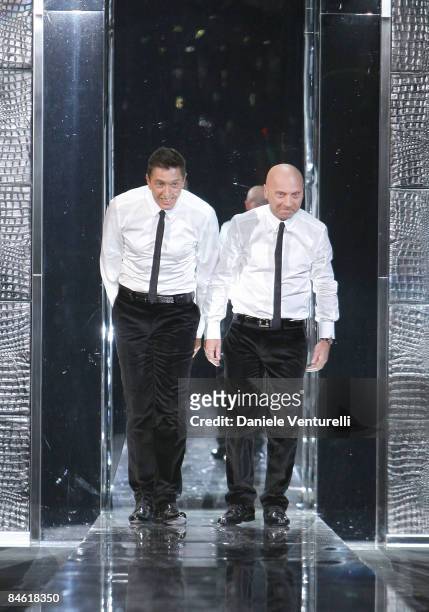 Designers Stefano Gabbana and Domenico Dolce acknoledge the applause of the audience after the Dolce & Gabbana show as part of Milan Fashion Week...