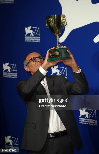 Venice, Italy. 09 September, 2017. Kamel El Basha poses with the Coppa Volpi for Best Actor Award for The Insult at the Award Winners photocall...