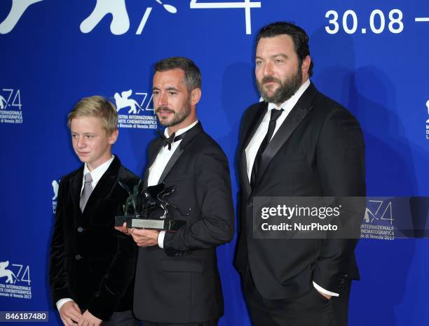 Venice, Italy. 09 September, 2017. Thomas Gioria, Xavier Legrand and Denis Menochet pose with the Silver Lion for Best Director Award for 'Jusqu' la...