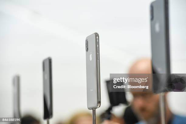 The Apple Inc. IPhone X is displayed during an event at the Steve Jobs Theater in Cupertino, California, U.S., on Tuesday, Sept. 12, 2017. Apple Inc....