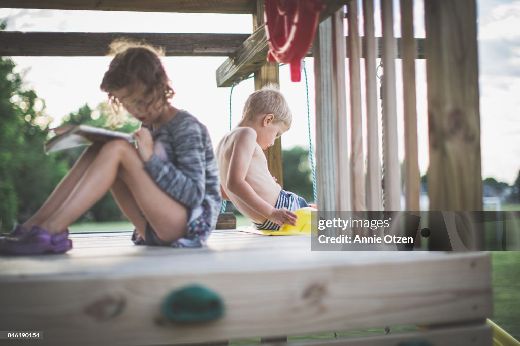 Children Sitting On Play structure
