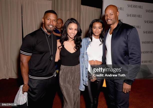Actor Jamie Foxx, Model Corinne Fox, Model Nala Wayans, and Actor Keenan Ivory Wayans pose backstage at the Sherri Hill NYFW SS18 fashion show at...