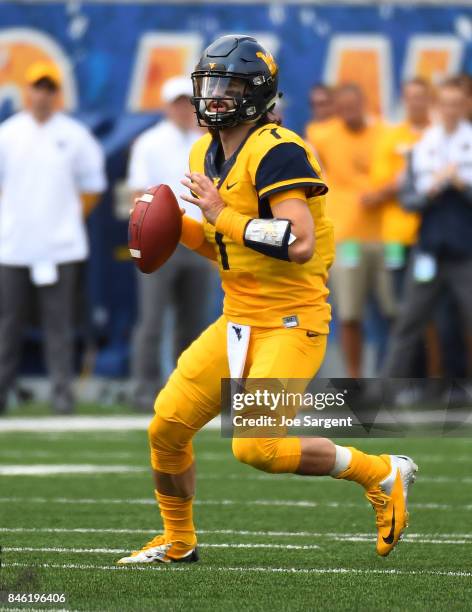 Will Grier of the West Virginia Mountaineers in action during the game against the East Carolina Pirates at Mountaineer Field on September 9, 2017 in...