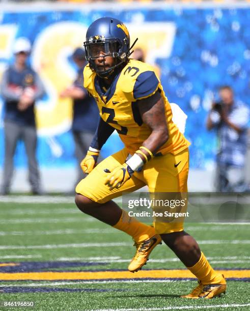 Al-Rasheed Benton of the West Virginia Mountaineers in action during the game against the East Carolina Pirates at Mountaineer Field on September 9,...