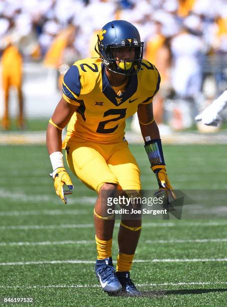Kenny Robinson of the West Virginia Mountaineers in action during the game against the East Carolina Pirates at Mountaineer Field on September 9,...