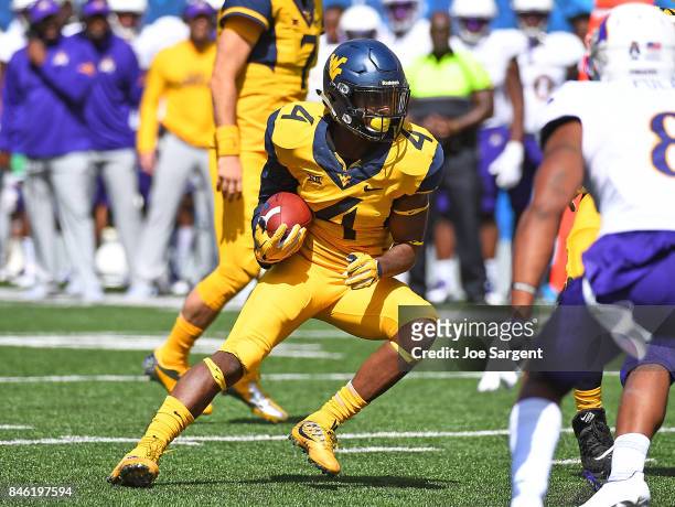 Kennedy McKoy of the West Virginia Mountaineers in action during the game against the East Carolina Pirates at Mountaineer Field on September 9, 2017...