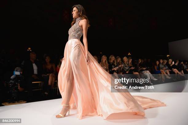 Model walks the rubway at the Sherri Hill NYFW SS18 Runway Show at Gotham Hall on September 12, 2017 in New York City.