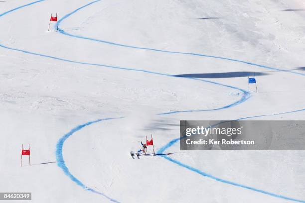 Didier Cuche of Switzerland competes on his way to winning the Men's Super G event held on the Face de Bellevarde course on February 4, 2009 in Val...