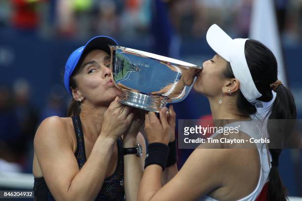 Open Tennis Tournament - DAY FOURTEEN. Martina Hingis of Switzerland and Yung-Jan Chan of Chinese Taipei with the trophy after winning the Women's...