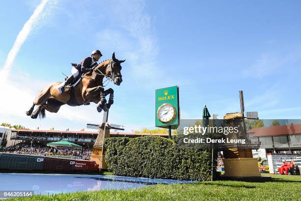 Kent Farrington rides in the individual jumping equestrian on the final day of the Masters tournament at Spruce Meadows on September 10, 2017 in...