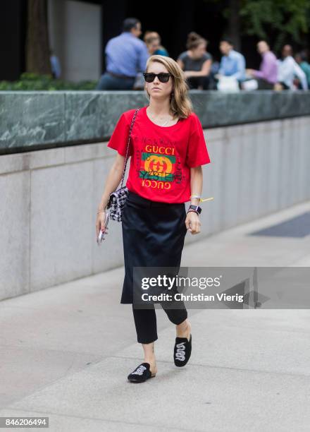 Jessica Minkoff wearing red Gucci tshirt, skirt over pants seen in the streets of Manhattan outside Gabriela Hearst during New York Fashion Week on...