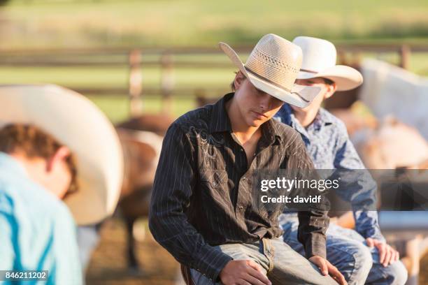 Watching Rodeo Group Of Young Cowboys Waiting And Watching At A Rodeo High-Res Stock ...