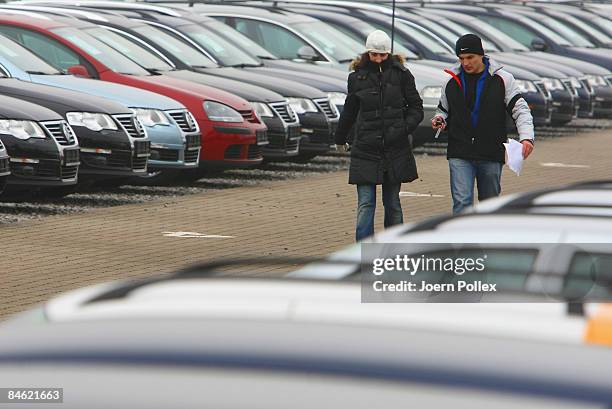 Customers are looking for a new car at a car dealer on February 4, 2009 in Bockel, Germany. The german Government support the automobile industry in...