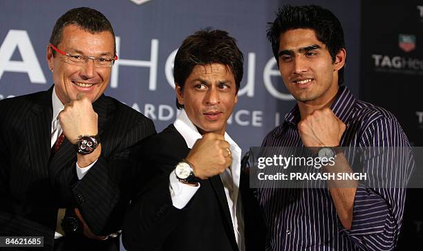 Tag Heuer President and CEO Jean-Christophe Babin , Bollywood star and Tag Heuer Brand Ambassador Shahrukh Khan and Indian Olympic bronze medallist...