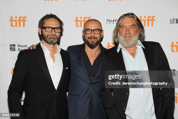 Producer Bart Van Langendonck, director Michaël R. Roskam, and producer Pierre-Ange Le Pogam attend the "Racer And The Jailbird" Premiere held at...