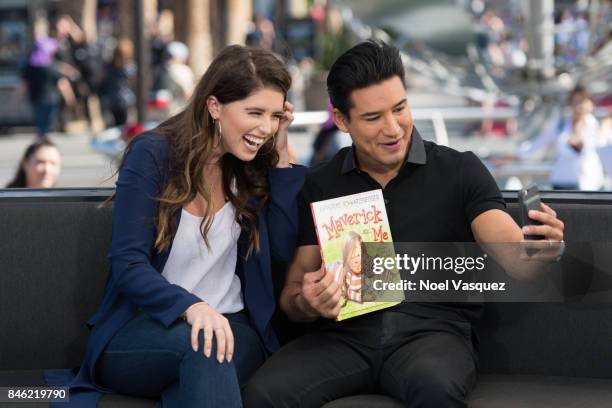 Katherine Schwarzenegger and Mario Lopez visit "Extra" at Universal Studios Hollywood on September 12, 2017 in Universal City, California.