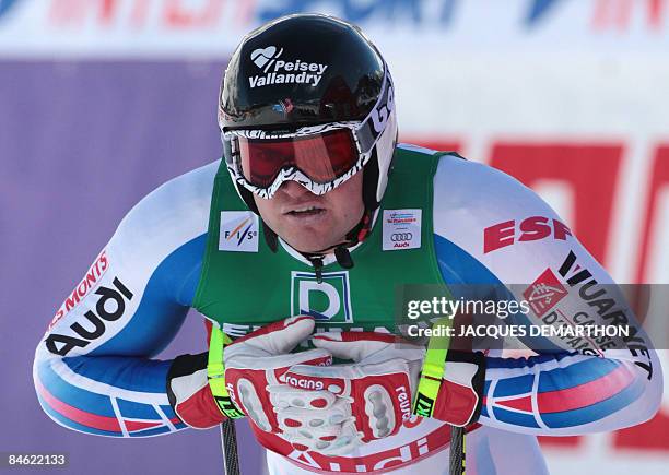 France's David Poisson reacts after the men's Super-G at the World Ski Championships on February 4, 2009 in Val d'Isere, French Alps. Switzerland's...