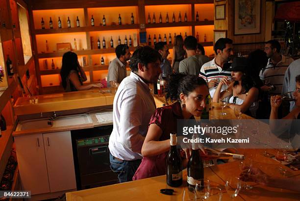 Visitors in the restaurant and bar where the wines are tasted and sold. Situated in the heart of Lebanon, in the Bekaa Valley, Chateau Kefraya's...