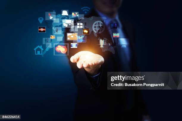 technology in the hand holding business diagram, modern wireless technology and social media illustration - interview icon stock-fotos und bilder