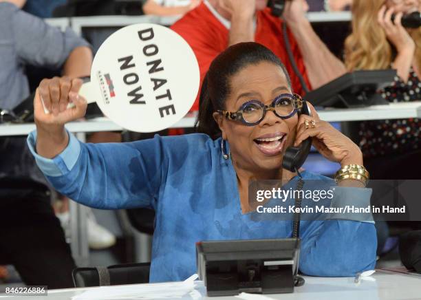 In this handout photo provided by Hand in Hand, Oprah Winfrey attends Hand in Hand: A Benefit for Hurricane Relief at Universal Studios AMC on...