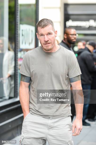 Musician Tim Commerford of Prophets of Rage leaves the "AOL Build" taping at the AOL Studios on September 12, 2017 in New York City.