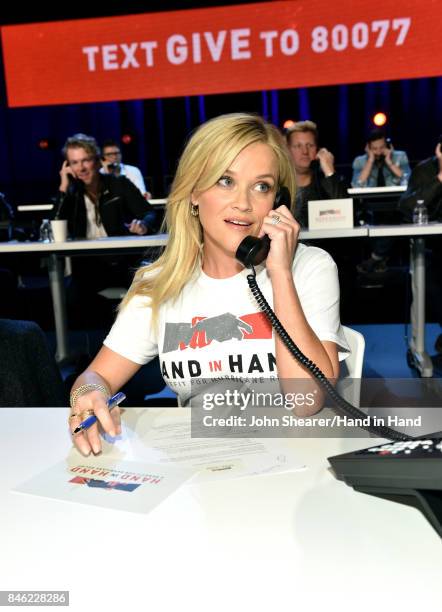 In this handout photo provided by Hand in Hand, Reese Witherspoon attends Hand in Hand: A Benefit for Hurricane Relief at the Grand Ole Opry House on...