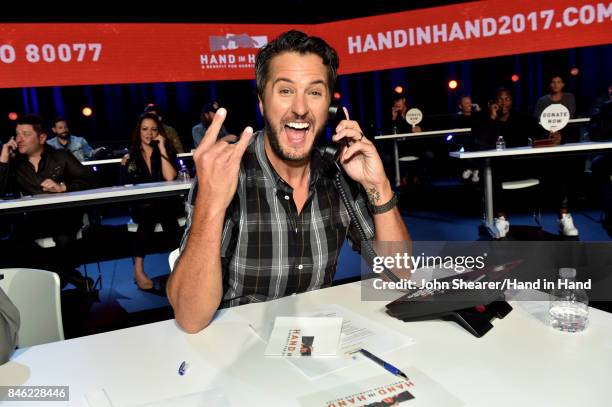 In this handout photo provided by Hand in Hand, Luke Bryan attends Hand in Hand: A Benefit for Hurricane Relief at the Grand Ole Opry House on...