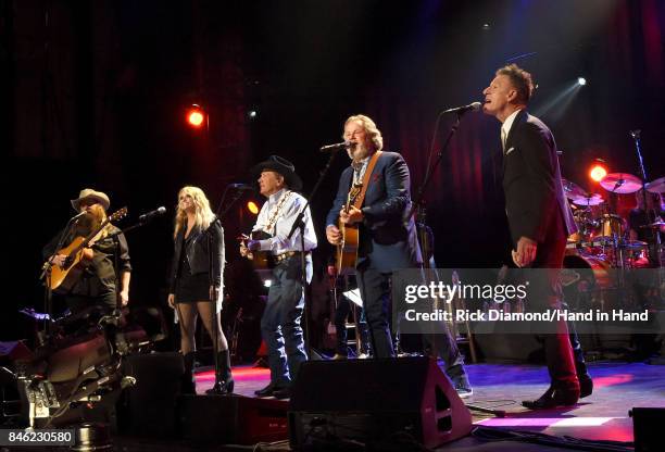 In this handout photo provided by Hand in Hand, Chris Stapleton, Miranda Lambert, George Strait, Lyle Lovett and Robert Early Keen perform onstage...