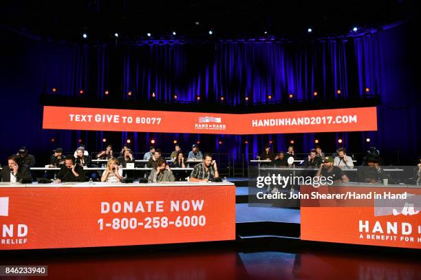 In this handout photo provided by Hand in Hand, A view of the call center during Hand in Hand: A Benefit for Hurricane Relief at the Grand Ole Opry...