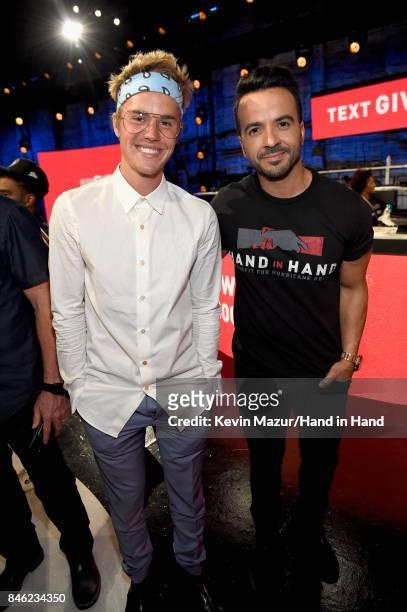 In this handout photo provided by Hand in Hand, Justin Bieber and Luis Fonsi attend Hand in Hand: A Benefit for Hurricane Relief at Universal Studios...