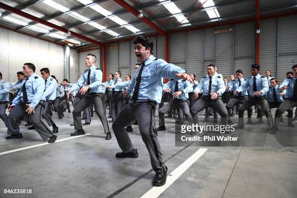Students from the Vanguard Military School perform a haka for Prime Minister Bill English on September 13, 2017 in Auckland, New Zealand. The latest...