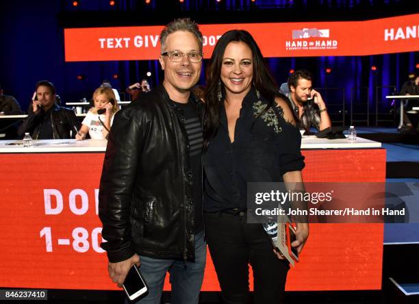 In this handout photo provided by Hand in Hand, Robert Deaton and Sara Evans attend Hand in Hand: A Benefit for Hurricane Relief at the Grand Ole...