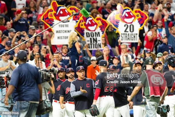 Manager Terry Francona celebrates with starting pitcher Corey Kluber of the Cleveland Indians after the Indians defeated the Detroit Tigers at...