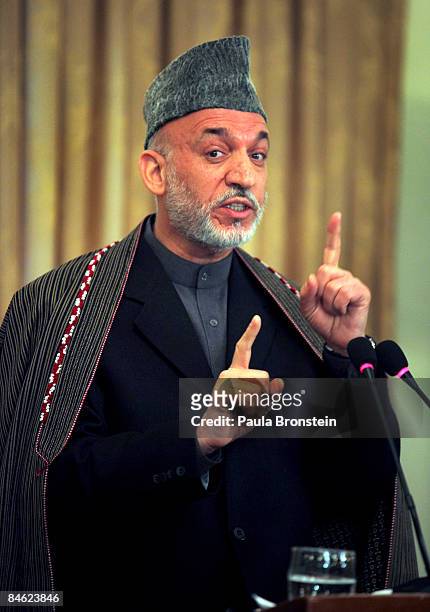 Afghan President Hamid Karzai speaks during a press conference with UN Secretary-General Ban Ki-moon at the presidential palace on an unannounced...