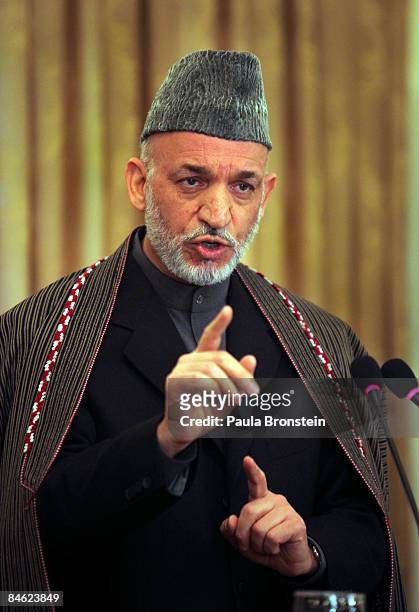 Afghan President Hamid Karzai speaks during a press conference with UN Secretary-General Ban Ki-moon at the presidential palace on an unannounced...