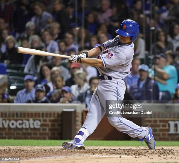 Norichika Aoki of the New York Mets bats in the 5th inning against the Chicago Cubs at Wrigley Field on September 12, 2017 in Chicago, Illinois.