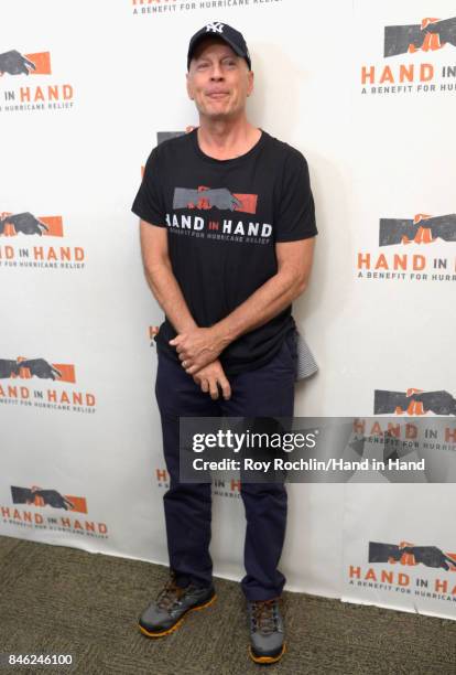 In this handout photo provided by Hand in Hand, Bruce Willis caption at ABC News' Good Morning America Times Square Studio on September 12, 2017 in...