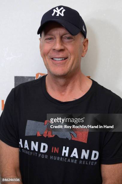 In this handout photo provided by Hand in Hand, Bruce Willis caption at ABC News' Good Morning America Times Square Studio on September 12, 2017 in...