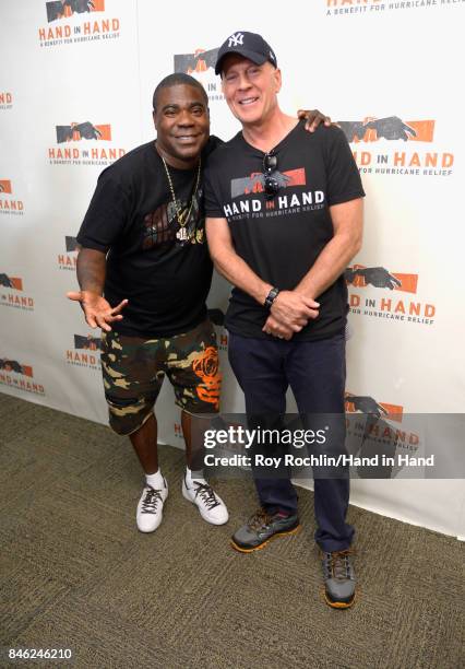 In this handout photo provided by Hand in Hand, Tracy Morgan and Bruce Willis caption at ABC News' Good Morning America Times Square Studio on...