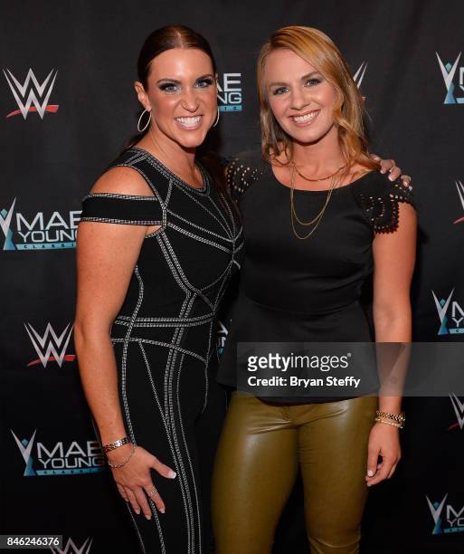 Chief Brand Officer Stephanie McMahon and Olympic Gold Medalist Erica Wiebe appear on the red carpet of the WWE Mae Young Classic on September 12,...